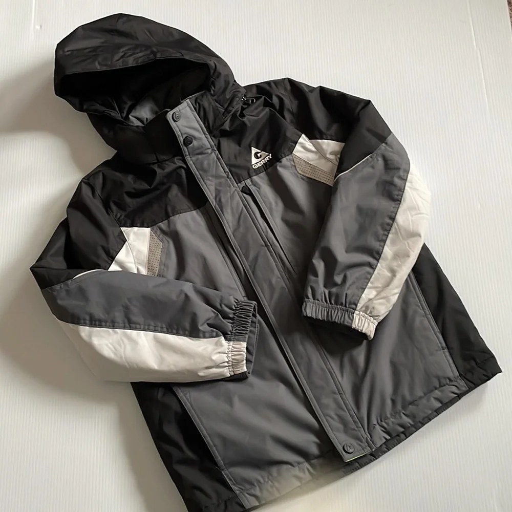 Gerry black & gray winter jacket with removable hood.  Boys size Medium